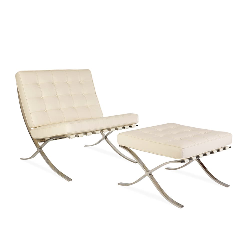 Angled front view of the white leather Barcelona Pavilion Chair and Ottoman on a white background