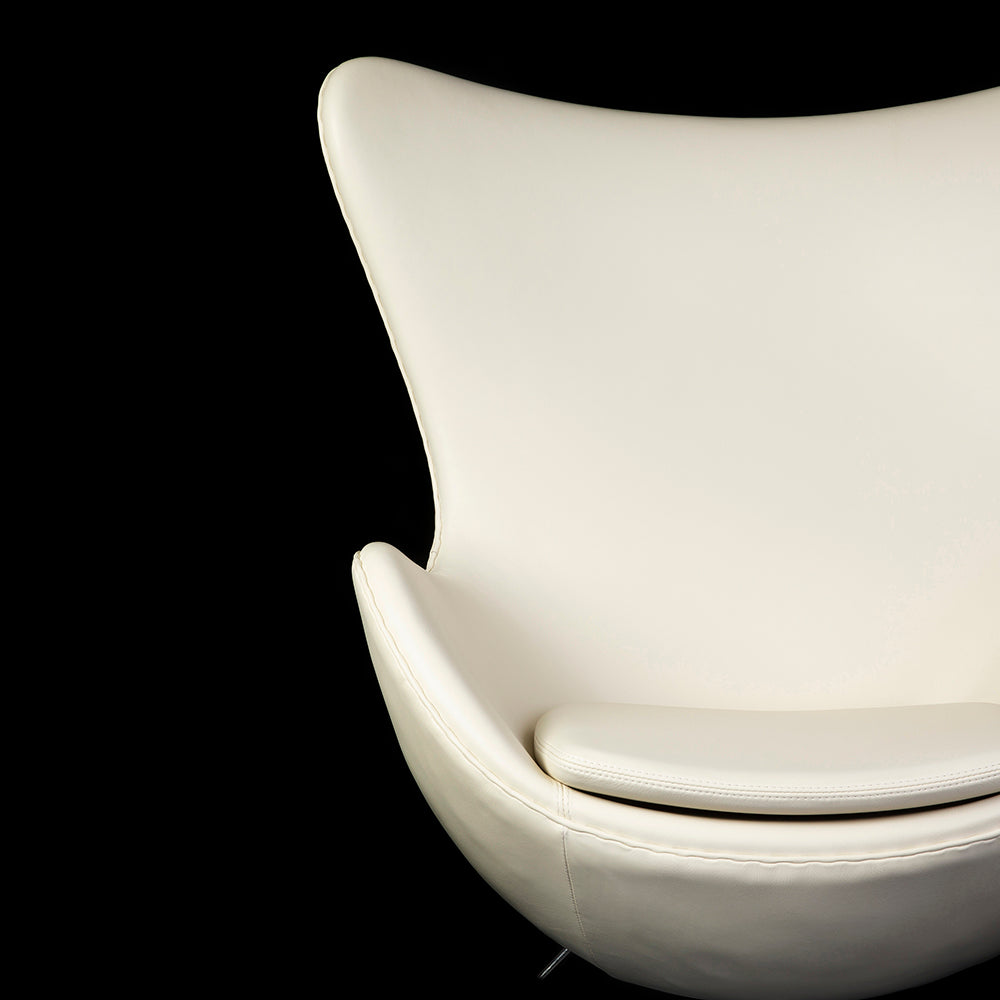 The Arne Jacobsen looks fantastic with the Pearl White soft deluxe Leather and is seen in a three quarter view against a black background
